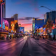 A street filled with neon lights