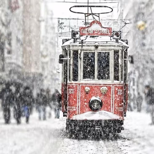Tram in a snowy city