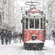 Tram in a snowy city