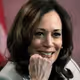 Kamila Harris smiles