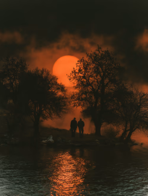 Two Walkers, One Red Sun