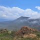 Between Clouds and Silence