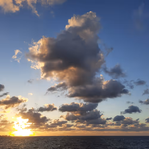 Sunset Time From the Sea