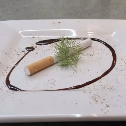 Cigarettes and a leaf