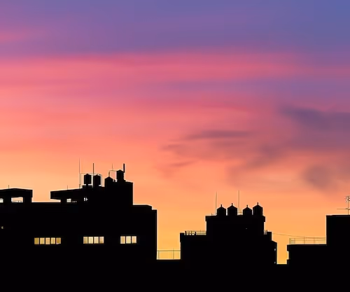 A city skyline at sunset