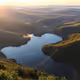 Misty Dawn Over Layered Peaks