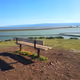 a chair by the bay