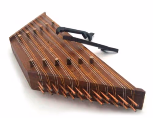 A child playing the dulcimer