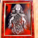 Framed painted laser etchings