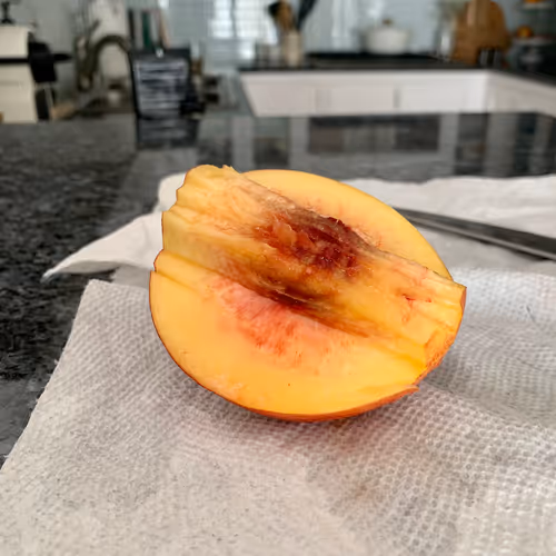 half eaten nectarine
