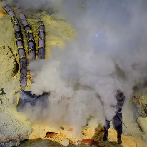 Miner collects sulphur - old