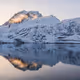 Symmetric landscape reflections by Johny Goerend - old