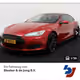Tesla - QMOsO8OwCp