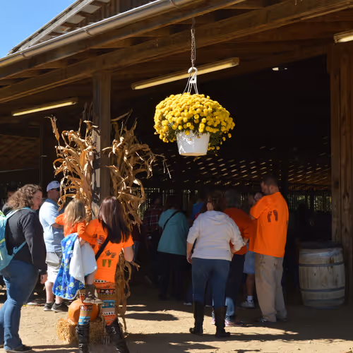 Wagon riders waiting at the barn