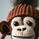 The little woolen monkey who is very bored alone in his corner