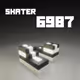 6987