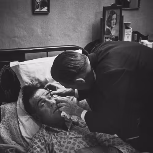 Country Doctor - Dr. Ernest Ceriani Examining Patient's Eye