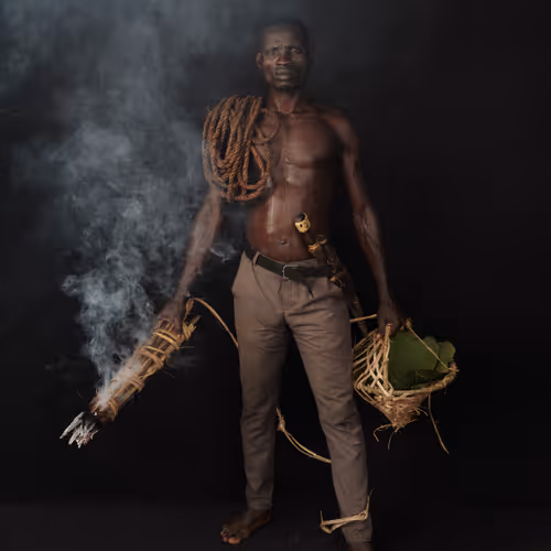 Ethiopia - Portraits - Portrait of Woretak with forest honey–gathering tools  