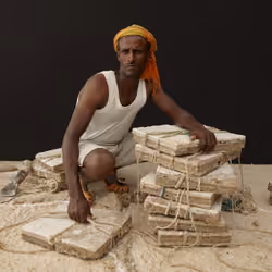 Ethiopia - Portraits - Portrait of Seisay with bricks of salt