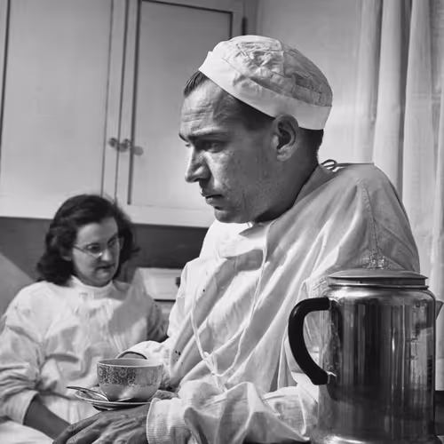 Country Doctor - Dr. Ernest Ceriani with Coffee, Cigarette, and Nurse in Hospital Kitchen