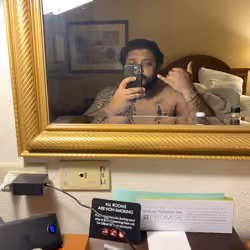 Lonely hawaiian contemplates masturbation in a hotel. 