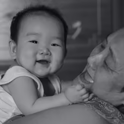 2 ladies, 3 generations apart sharing a light hearted moment