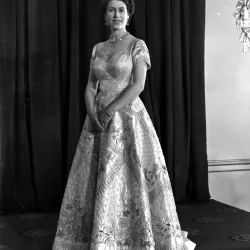 Queen Elizabeth II debuts her white satin coronation gown