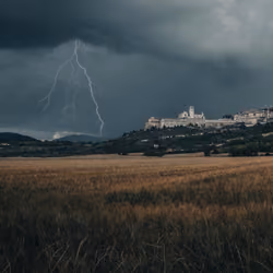 Lightning strikes above Asisi, Italy