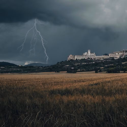 Lightning strikes above Asisi, Italy