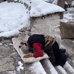 Tibetan woman praying
