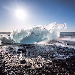 Crystal Ice on Black Sand