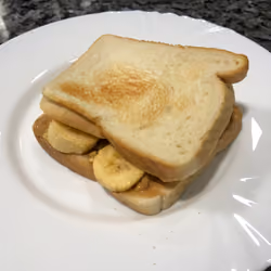 A perfectly delicious Toasted Peanut Butter and Banana sandwich