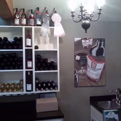 West Wind Winery business/logo art on display in tasting room