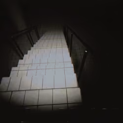 Walking down cistern stairs