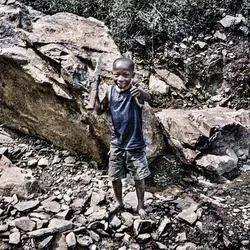 congolese boy with machete
