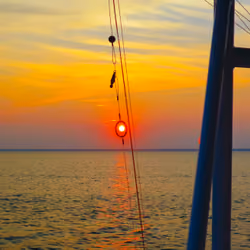 Capturing Light: Sunset Sailing Ring 1:1