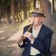 The old man plays the Armenian flute