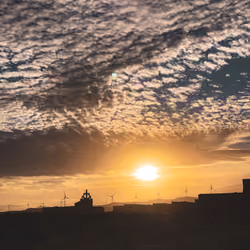 sunset over abandoned sanatorium