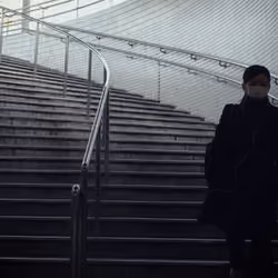 Figure on the stairs