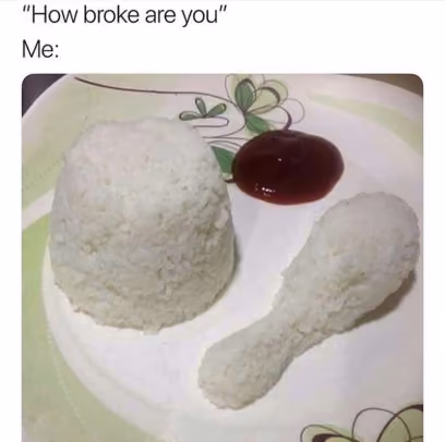 -a-pic-of-a-plate-of-rice-shaped-like-a-chicken-drumstick-next-to-some-ketchup