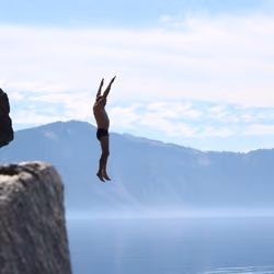 Sky Man Jumps in Lake
