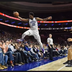 Joel Embiid leaps into crowd