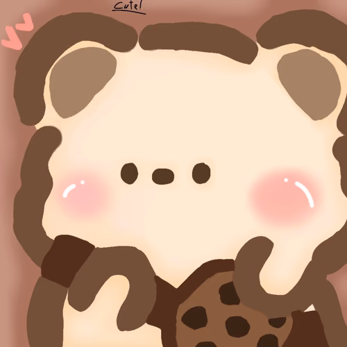 Teddy holding a cookie 