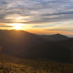 Sun Peaks over New Hampshire Mountain