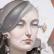10619