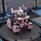 7653