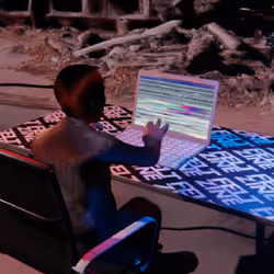 Desktop #214: The Business in the Black Slim Chair With a Drone and a Please Stand By Monitor on a F
