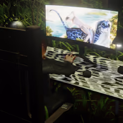 Desktop #31: The Business in the Electric Chair With a Desk Lamp and a Kitty Monitor on a Pattern Ta