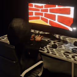 Desktop #102: The Hacker in the Black Slim Chair With a Desk Lamp and a Maze Monitor on a Pattern Ta