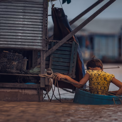 Kids swimming in Cambodia
